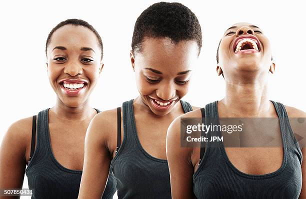 three time multi exposure of young woman smiling and laughing - same person different outfit foto e immagini stock