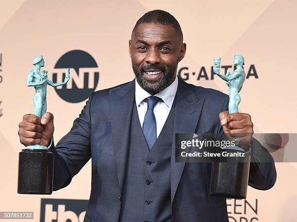 Idris Elba poses at the 22nd Annual Screen Actors Guild Awards at The Shrine Auditorium on January 30, 2016 in Los Angeles, California.