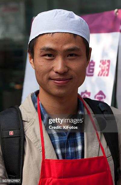 chinese muslin at  eid al-adha celebreation  in chengdu (series) - tribal head gear in china stock pictures, royalty-free photos & images