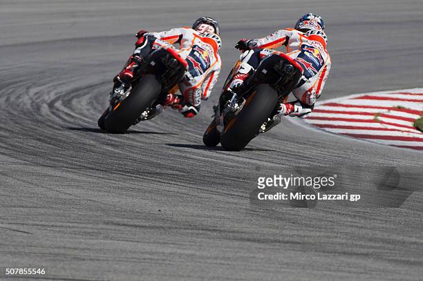 Marc Marquez of Spain and Repsol Honda Team rleads Dani Pedrosa of Spain and Repsol Honda Team during the MotoGP Tests In Sepang at Sepang Circuit on...