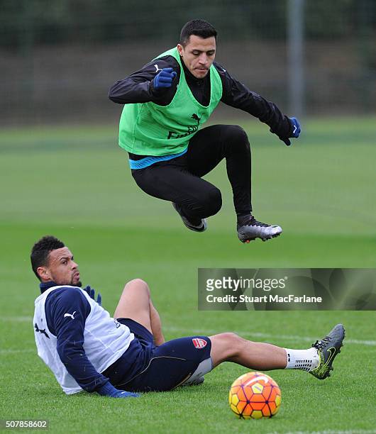 Francis Coquelin and Alexis Sanchez of Arsenal during a training session at London Colney on February 1, 2016 in St Albans, England.