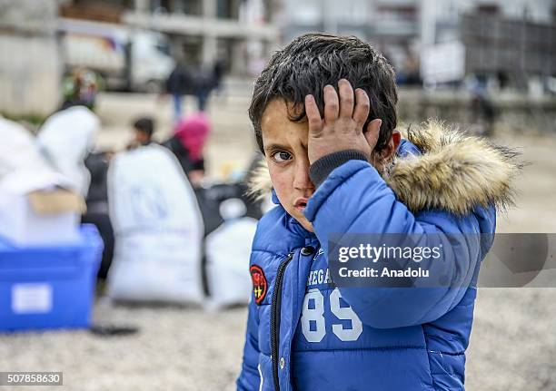 Turkmen and Arab families, fled from their homes due to Russian and Assad Regime forces attacks to Turkmen villages in Lattakia, wait for...