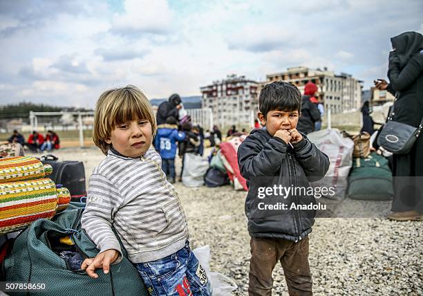 Turkmen and Arab families, fled from their homes due to Russian and Assad Regime forces attacks to Turkmen villages in Lattakia, wait for...