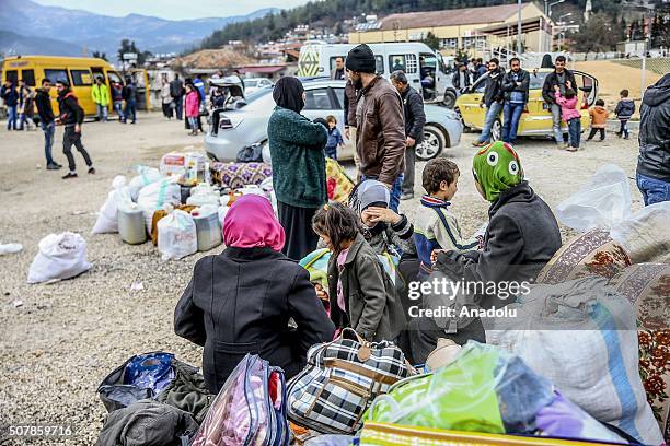 Turkmen and Arab families, fled from their homes due to Russian and Assad Regime forces attacks to Turkmen villages in Lattakia, wait for...