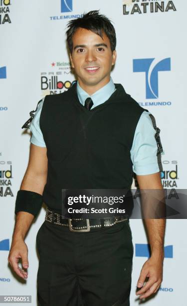 Singer Luis Fonsi poses backstage during the 2004 Billboard Latin Music Awards at the Miami Arena April 29, 2004 in Miami, Florida.