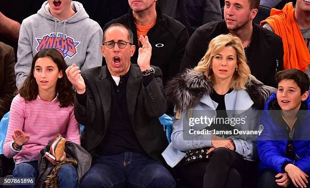 Sascha Seinfeld, Jerry Seinfeld, Jessica Seinfeld and Julian Kal Seinfeld attend the Golden State Warriors vs New York Knicks game at Madison Square...