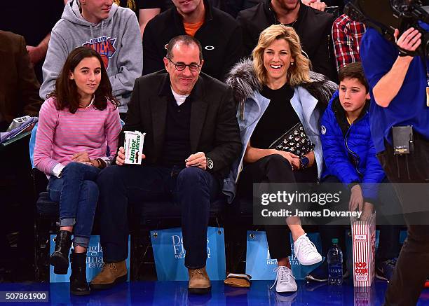 Sascha Seinfeld, Jerry Seinfeld, Jessica Seinfeld and Julian Kal Seinfeld attend the Golden State Warriors vs New York Knicks game at Madison Square...