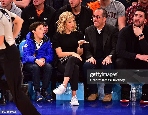 Julian Kal Seinfeld, Jessica Seinfeld, Jerry Seinfeld and Matt Harvey attend the Golden State Warriors vs New York Knicks game at Madison Square...
