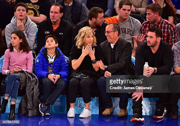 Sascha Seinfeld, Julian Kal Seinfeld, Jessica Seinfeld, Jerry Seinfeld and Matt Harvey attend the Golden State Warriors vs New York Knicks game at...