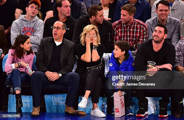 Sascha Seinfeld, Jerry Seinfeld, Jessica Seinfeld, Julian Kal Seinfeld and Matt Harvey attend the Golden State Warriors vs New York Knicks game at...