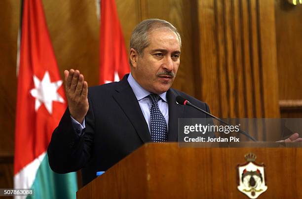 Jordanian counterpart Nasser Judeh attends a joint press conference with British Foreign Secretary Philip Hammond on February 1, 2016 in Amman,...