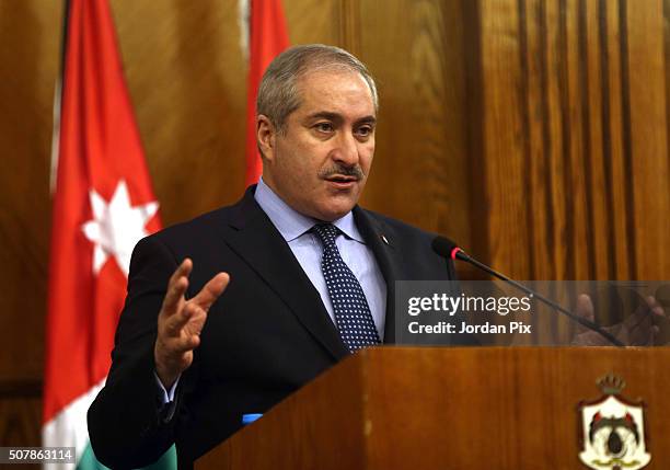 Jordanian counterpart Nasser Judeh attends a joint press conference with British Foreign Secretary Philip Hammond on February 1, 2016 in Amman,...