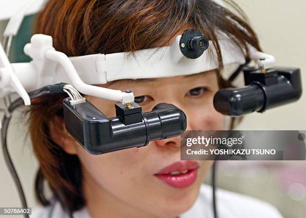 Prototype model of a head mount display for the low-vision patients, who has functional disorder on retina or crystalline lens of their eyes,...