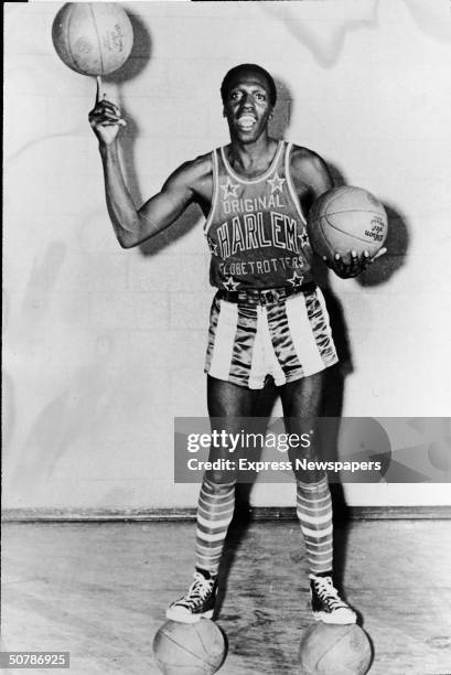 Portrait of American basketball player Meadowlark Lemon of the Harlem Globetrotters balancing a basketball on his finger, May 15, 1968.
