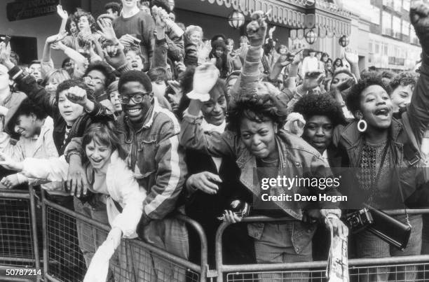 Excited fans of American pop singer Michael Jackson await his arrival, 1985.