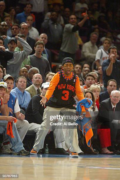Director/actor Spike Lee yells from his courtside seats in Game three of the Eastern Conference Quarterfinals during the NBA Playoffs between the New...