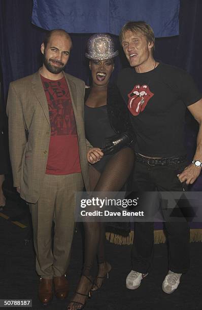 Singer, Grace Jones with actors, Dolph Lundgren and Billy Zane at his birthday party held at The Shepherds Bush Empire on 11th March 2004, in London....