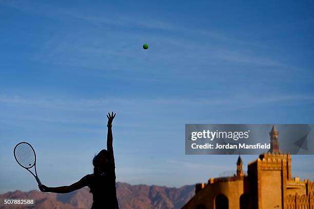 Katie Swan of Great Britain serves during a practice session ahead of the start of the start of the Fed Cup at the Municipal Tennis Club on February...