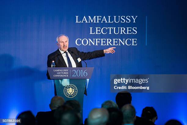 Ewald Nowotny, governor of Austria's central bank, also known as the Oesterreichische Nationalbank , gestures as he speaks during a conference in...
