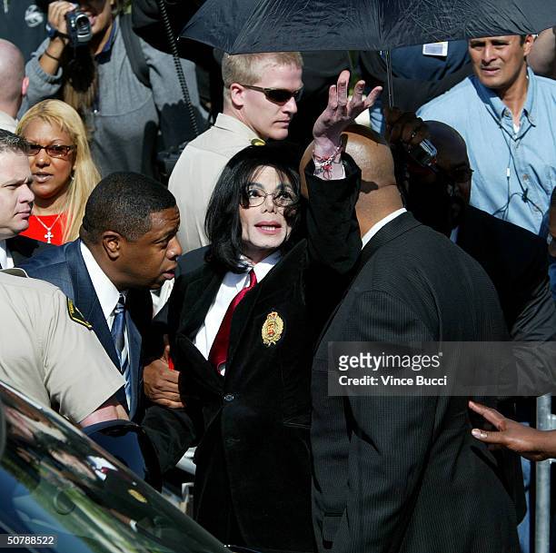 Singer Michael Jackson leaves the courthouse after his arraignment where he pleaded not guilty to a grand jury indictment of numerous child...