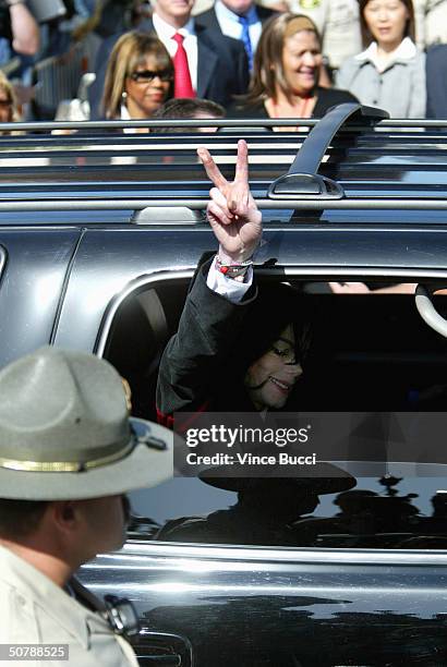 Singer Michael Jackson leaves the courthouse after his arraignment where he pleaded not guilty to a grand jury indictment of numerous child...