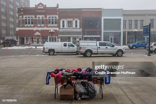 The table of a vendor selling Trump merchandise ahead of a rally with Republican presidential candidate Donald Trump at the Ramada Waterloo Hotel and...