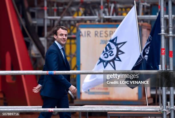 French Economy and Industry minister Emmanuel Macron leaves after the MSC Meraviglia cruise ship coins ceremony, on February 1, 2016 in...