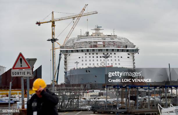 The MSC Harmony of the Seas cruise ship is pictured, on February 1, 2016 in Saint-Nazaire, western France. / AFP PHOTO / LOIC VENANCE