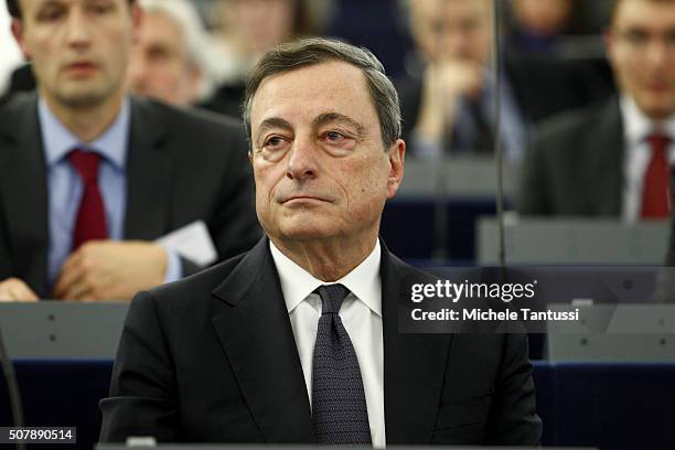 The governor of the European central Bank, or ECB Mario Draghi listens in the plenary room in the European Parliament ahead of the debate on the ECB...