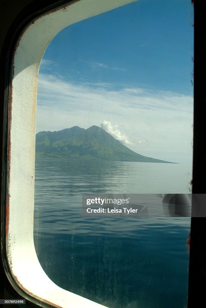 View of Sangeang Island and Volcano, off the island of...