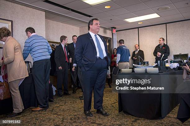 Republican presidential candidate, New Jersey Gov. Chris Christie arrives at the Bull Moose Club February 1, 2016 in downtown Des Moines, Iowa to...