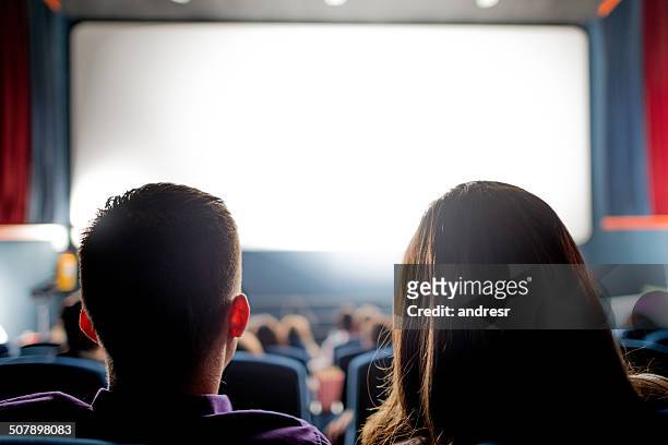 people at the cinema - film and television screening stock pictures, royalty-free photos & images