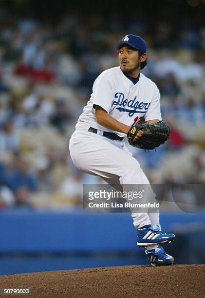 Kazuhisa Ishii of the Los Angeles Dodgers pitches against the Montreal Expos on April 30, 2004 at Dodger Stadium in Los Angeles, California.