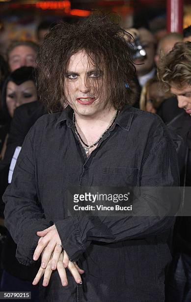 Singer Robert Smith of the English rock band The Cure attends the band's induction into the Rock Walk at the Guitar Center on April 30, 2004 in...