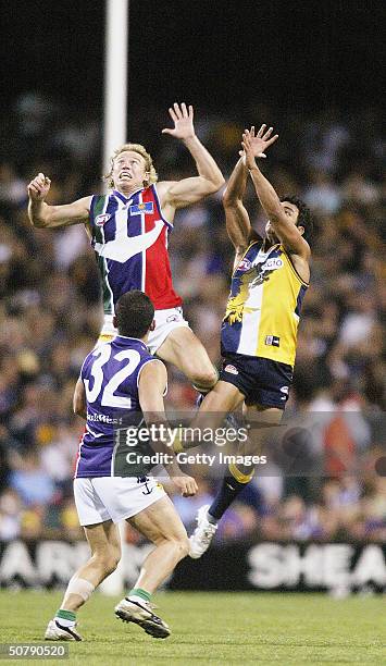 Shaun McManus of the Dockers in action against Daniel Kerr of the Eagles during the round six AFL match between the West Coast Eagles and Fremantle...