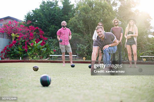 playing lawn bowling - lawn bowling stock pictures, royalty-free photos & images