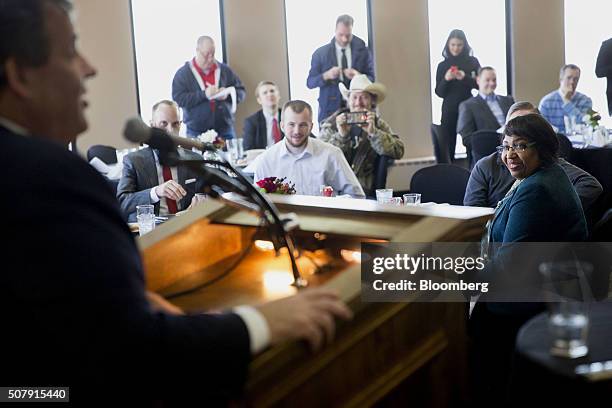 Candy Carson, wife of 2016 Republican presidential candidate Ben Carson, right, smiles while listening to Chris Christie, governor of New Jersey and...