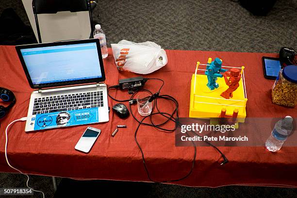 Snacks and diversions at a volunteer's workstartion Senator Rand Paul's Des Moines campaign headquarters on February 1, 2016 in Des Moines, Iowa....