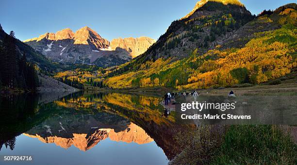 taking an image capture of photographers...and maroon bells - white river national forest stock pictures, royalty-free photos & images