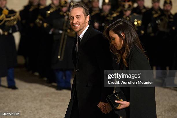 French DJ David Guetta and girlfriend Jessica Ledon arrive at Elysee Palace as French President Francois Hollande receives the Cuban President Raul...