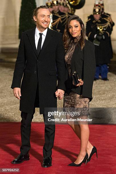French DJ David Guetta and girlfriend Jessica Ledon arrive at Elysee Palace as French President Francois Hollande receives the Cuban President Raul...