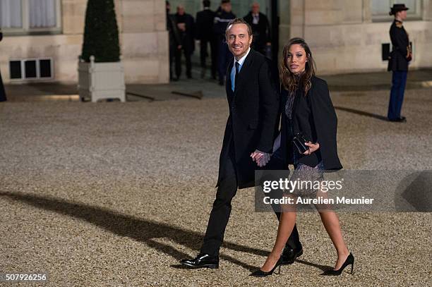 French DJ David Guetta and girlfriend Jessica Ledon arrive at Elysee Palace as French President Francois Hollande receives the Cuban President Raul...