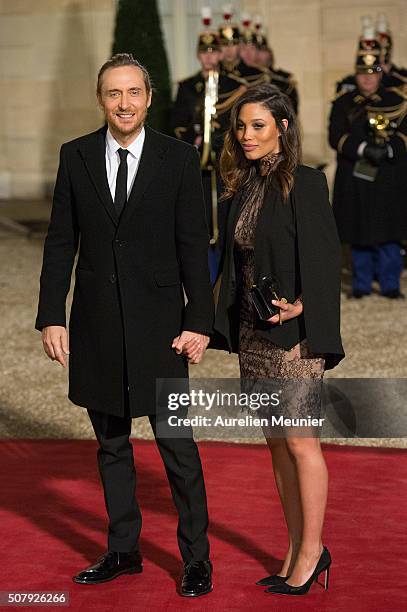 French DJ David Guetta and girlfriend Jessica Ledon arrive at Elysee Palace as French President Francois Hollande receives the Cuban President Raul...