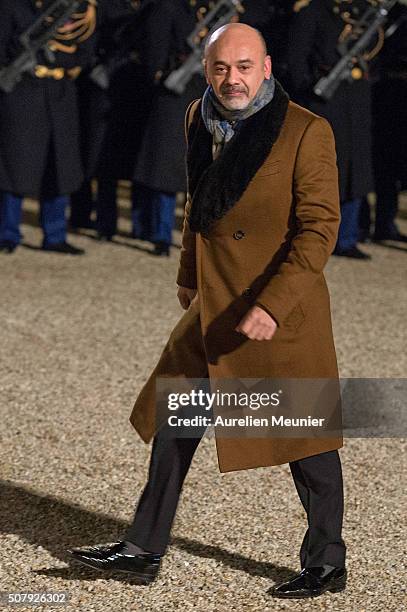 Christian Louboutin arrives at Elysee Palace as French President Francois Hollande receives the Cuban President Raul Castro for a State Diner on...