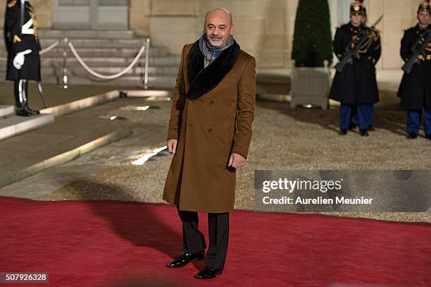 Christian Louboutin arrives at Elysee Palace as French President Francois Hollande receives the Cuban President Raul Castro for a State Diner on...