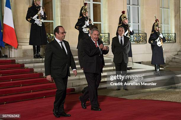 French President Francois Hollande walkes out Cuban President Raul Castro after the press conference and before the State Diner in his honor at...