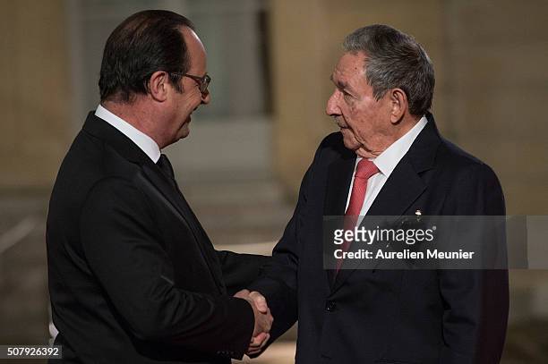 French President Francois Hollande walkes out Cuban President Raul Castro after the press conference and before the State Diner in his honor at...
