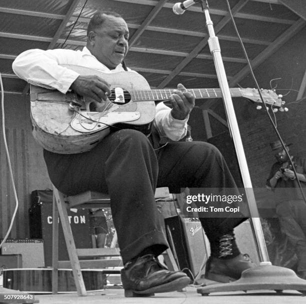 Photo of Big Joe Williams performing in Ann Arbor, Michigan. Circa 1969