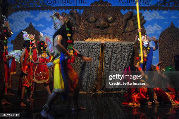 Indonesian artists perform during the traditional "Tari Topeng" or dance mask show at Padepokan Art Panji Asmoro Bangun, on February 01, 2016 in...