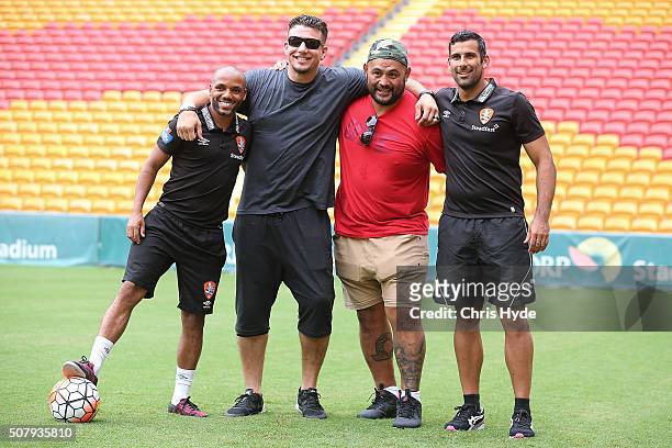 Henrique of the Roar, UFC Fighters Frank Mir, Mark Hunt and Jamie Young of the Roar pose for photographs during a media opportunity at Suncorp...